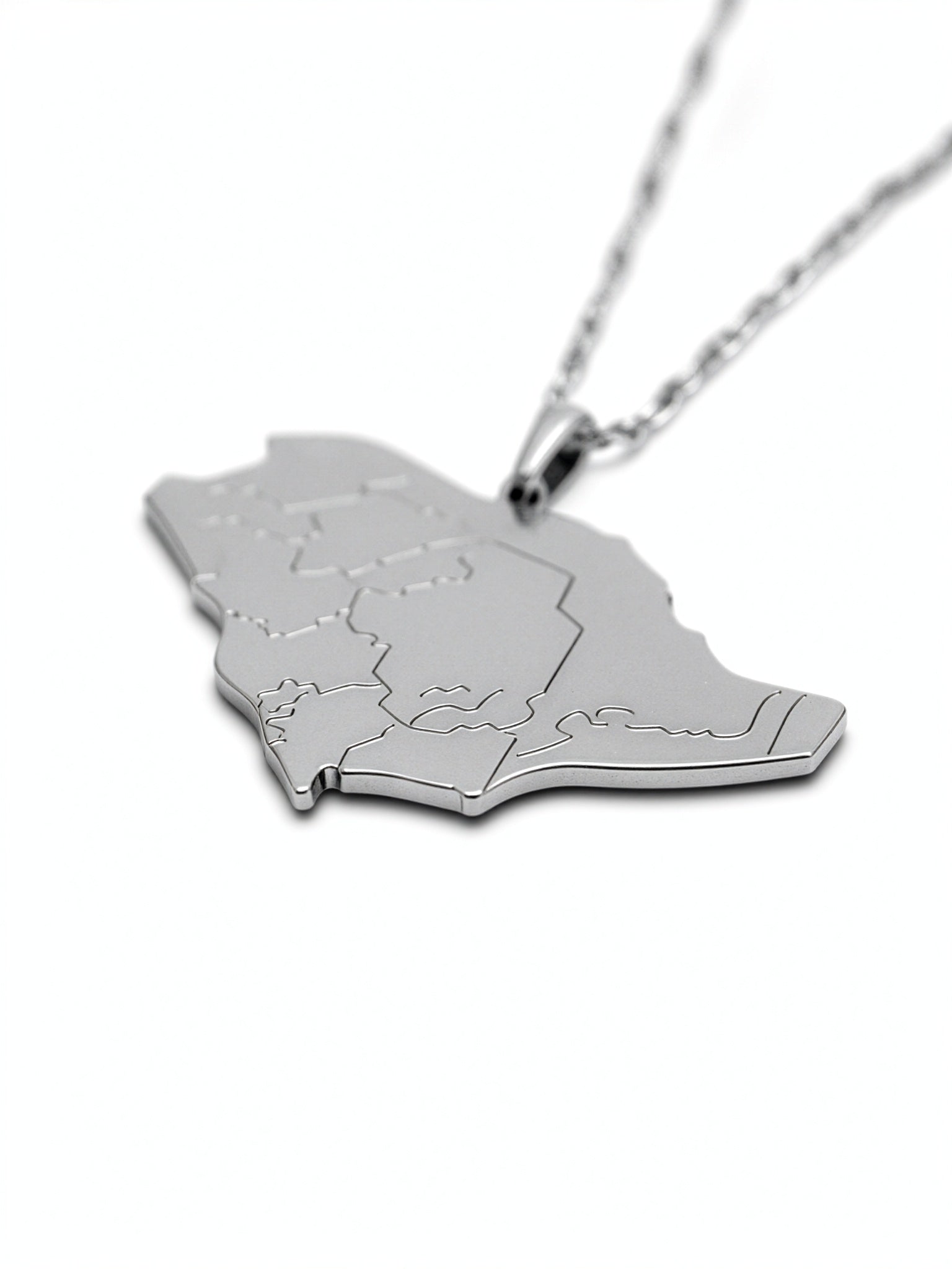 Silver plated Saudi Arabia map pendant necklace with detailed regional outlines on a chain for cultural pride from KIRO UK
