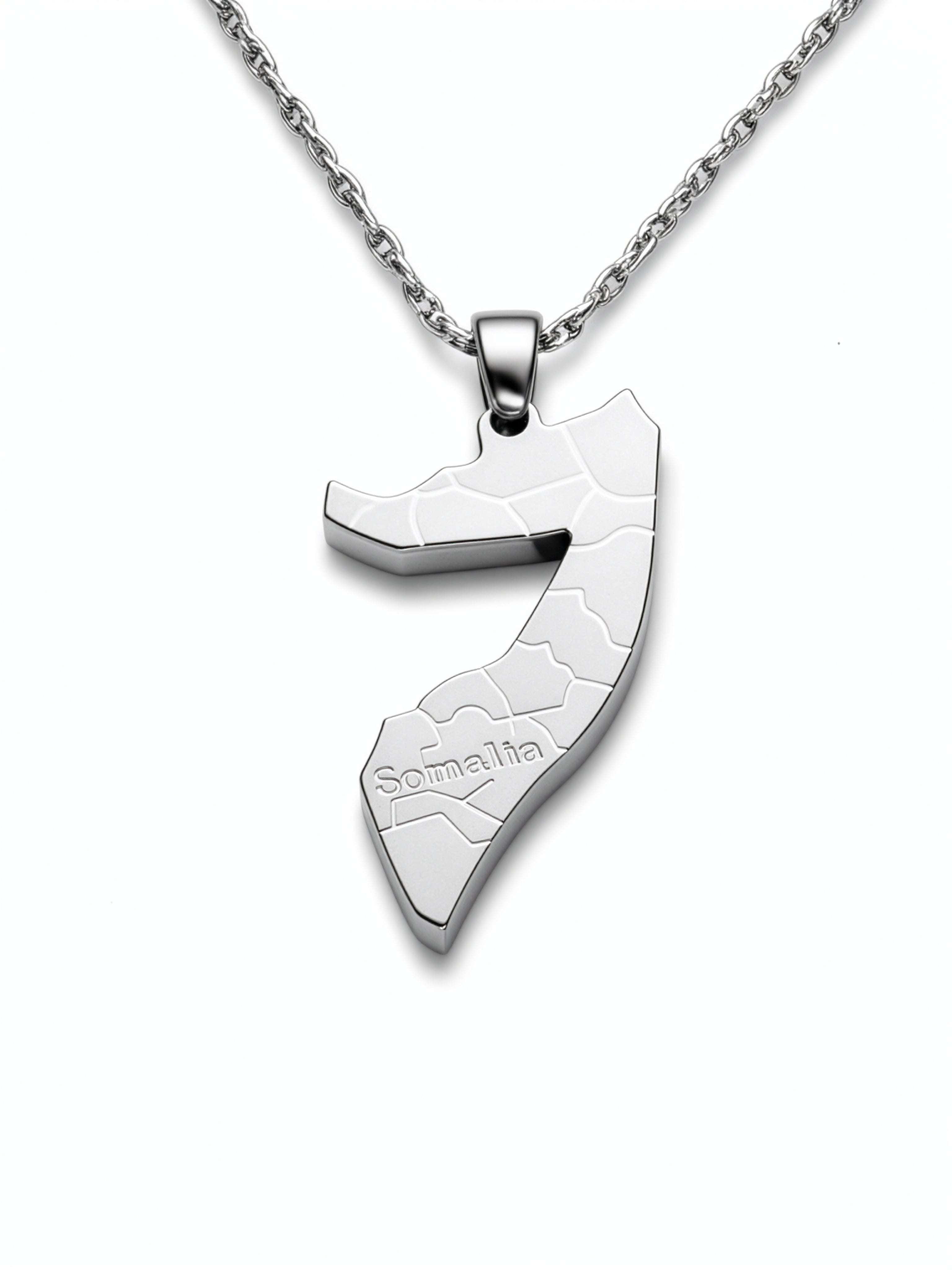 Silver plated Somalia map necklace with Somalia engraved on the pendant and textured map detail on a chain