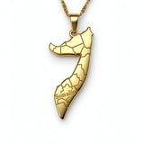 Gold plated Somalia map pendant necklace with regional outline details and Somalia engraved on the front on a linked chain from KIRO UK