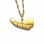 Gold plated map pendant necklace shaped like Somaliland with Somaliland engraved on the front and a textured chain by KIRO UK