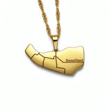 Gold plated map pendant necklace shaped like Somaliland with Somaliland engraved on the front and a textured chain by KIRO UK
