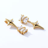 18K gold plated star drop earrings with clear cubic zirconia accents and ornate cage details from KIRO UK Earrings