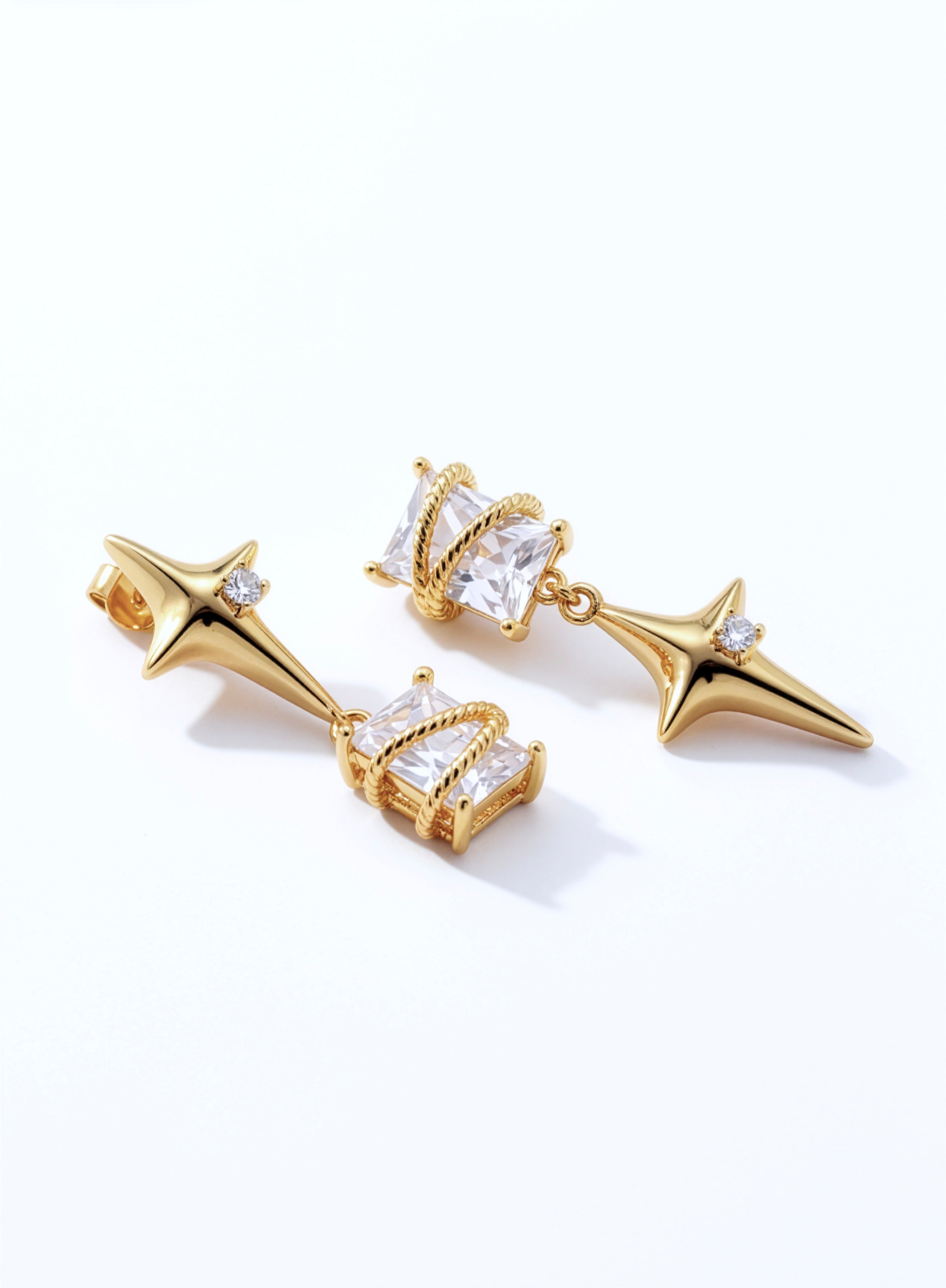 18K gold plated star drop earrings with clear cubic zirconia accents and ornate cage details from KIRO UK Earrings