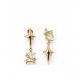 18K gold plated star drop earrings with clear cubic zirconia accents and ornate gold loops on a white background from KIRO UK Earrings