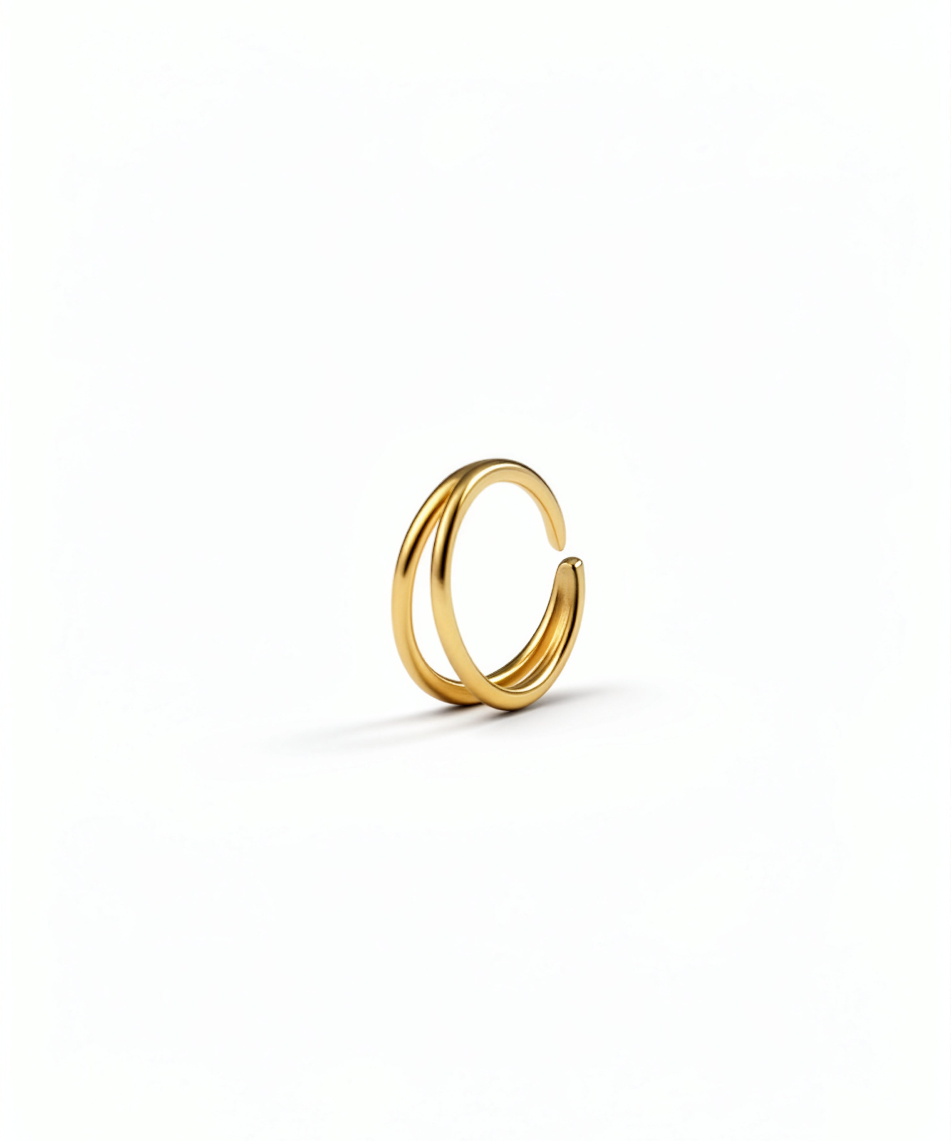 KIRO UK gold sterling silver double nose ring featuring two linked hoops for a stylish stacked look on one piercing