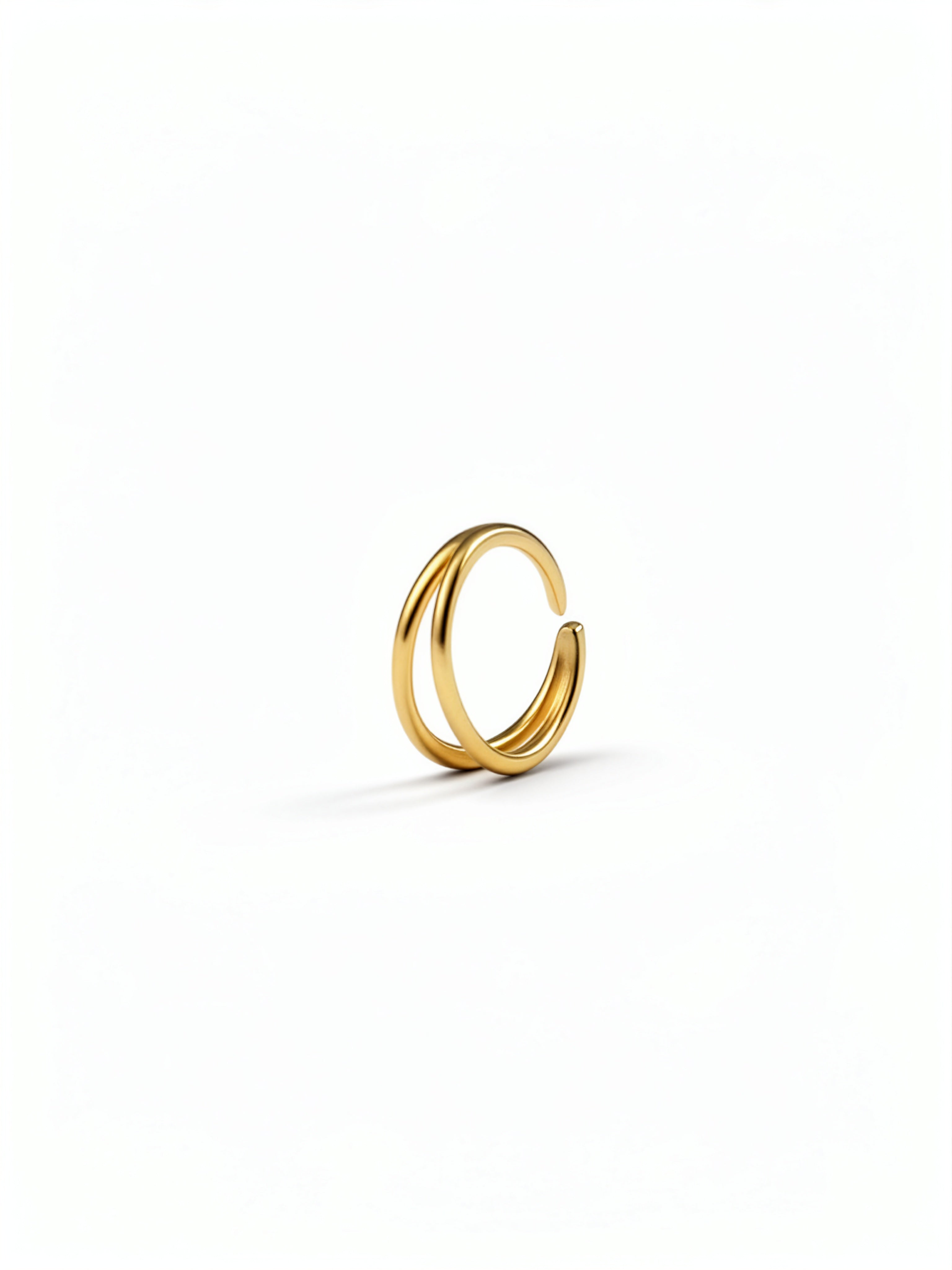 KIRO UK gold sterling silver double nose ring featuring two linked hoops for a stylish stacked look on one piercing