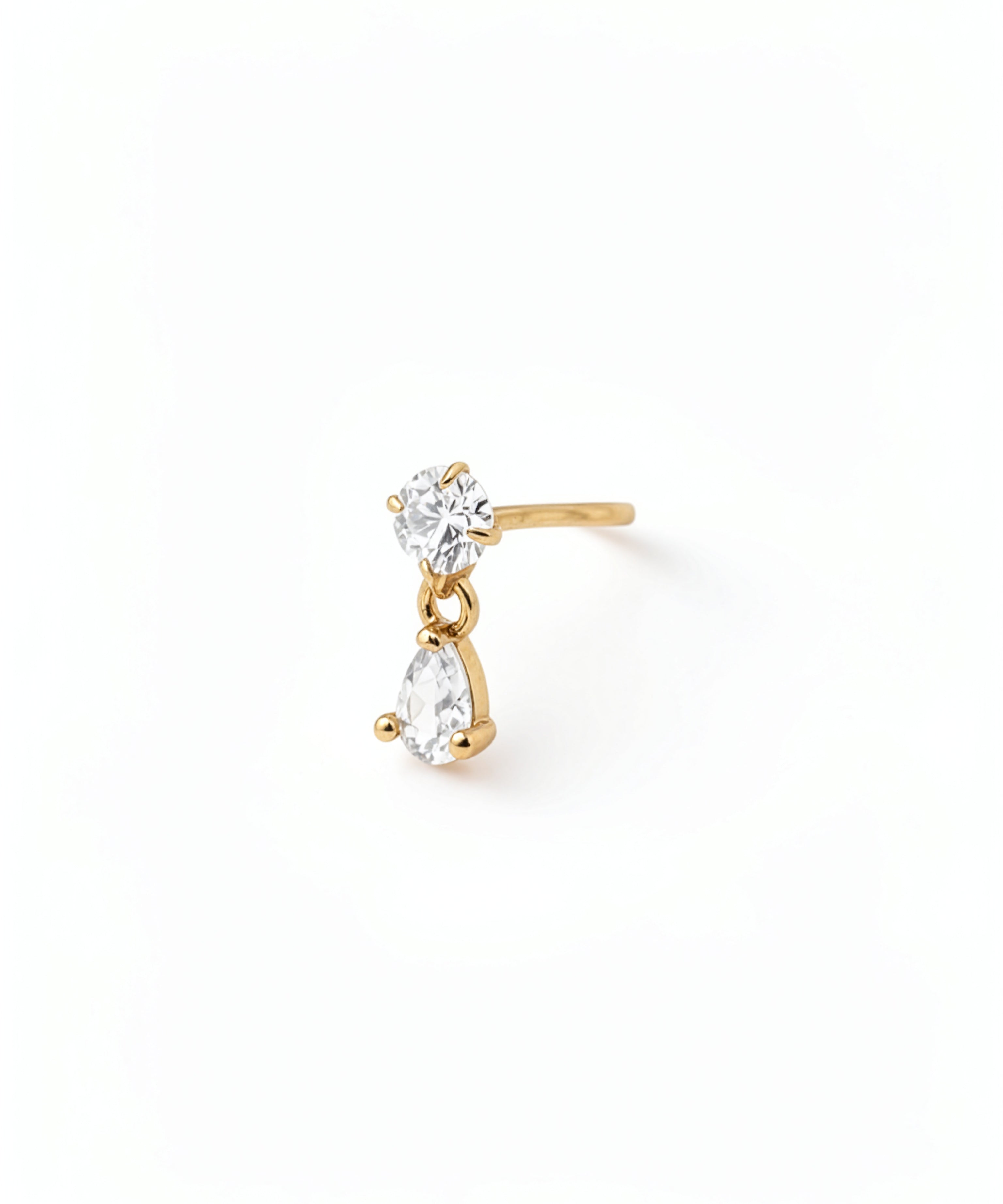 Clear cubic zirconia teardrop nose stud with a dangling charm and L shaped sterling silver post from KIRO UK