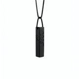 Black cuboid Egyptian statement necklace with engraved hieroglyphic symbols on a geometric pendant and chain by KIRO UK