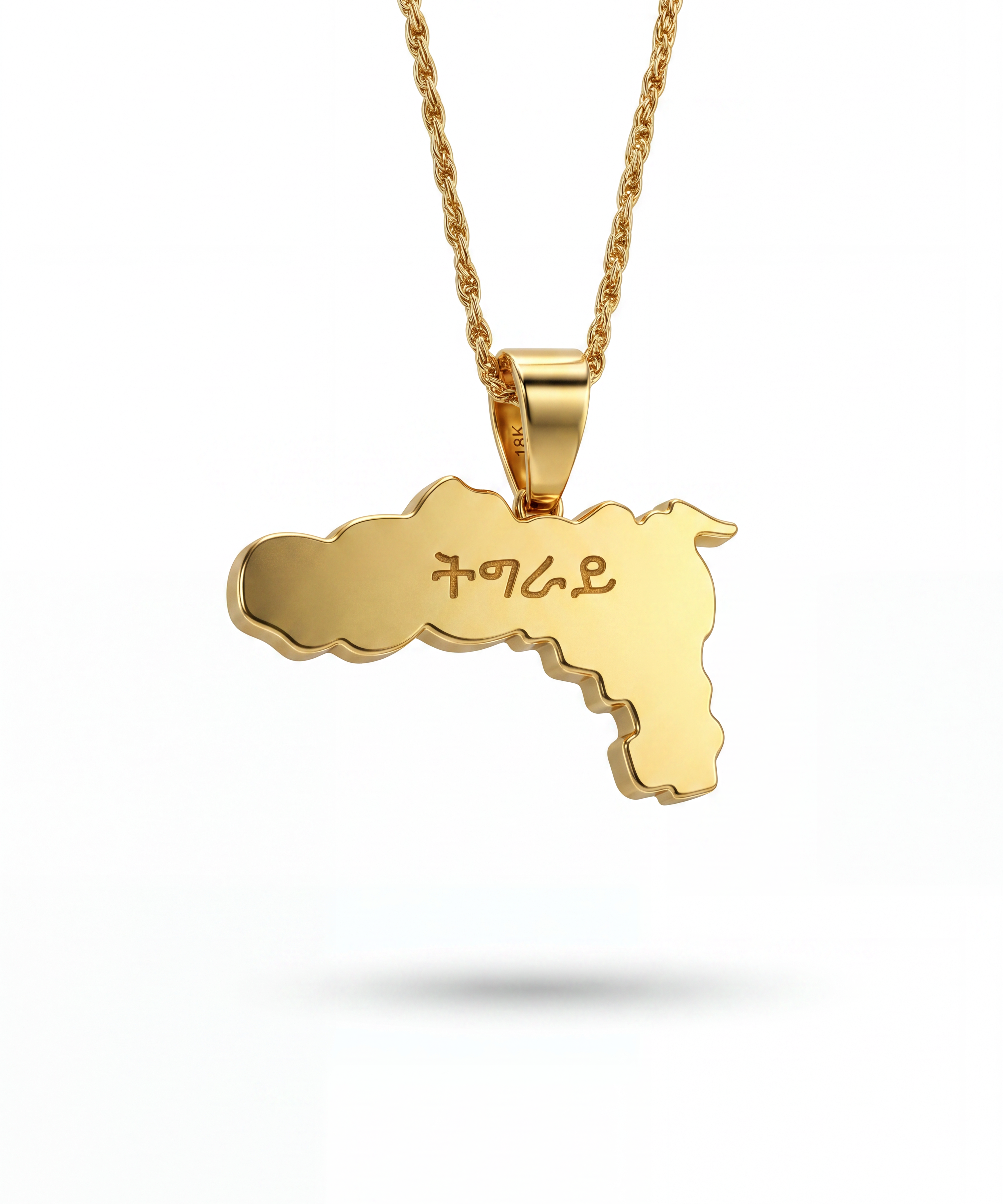 Gold plated Tigray map pendant necklace with geometric detailing and chain by KIRO UK for cultural pride and everyday wear