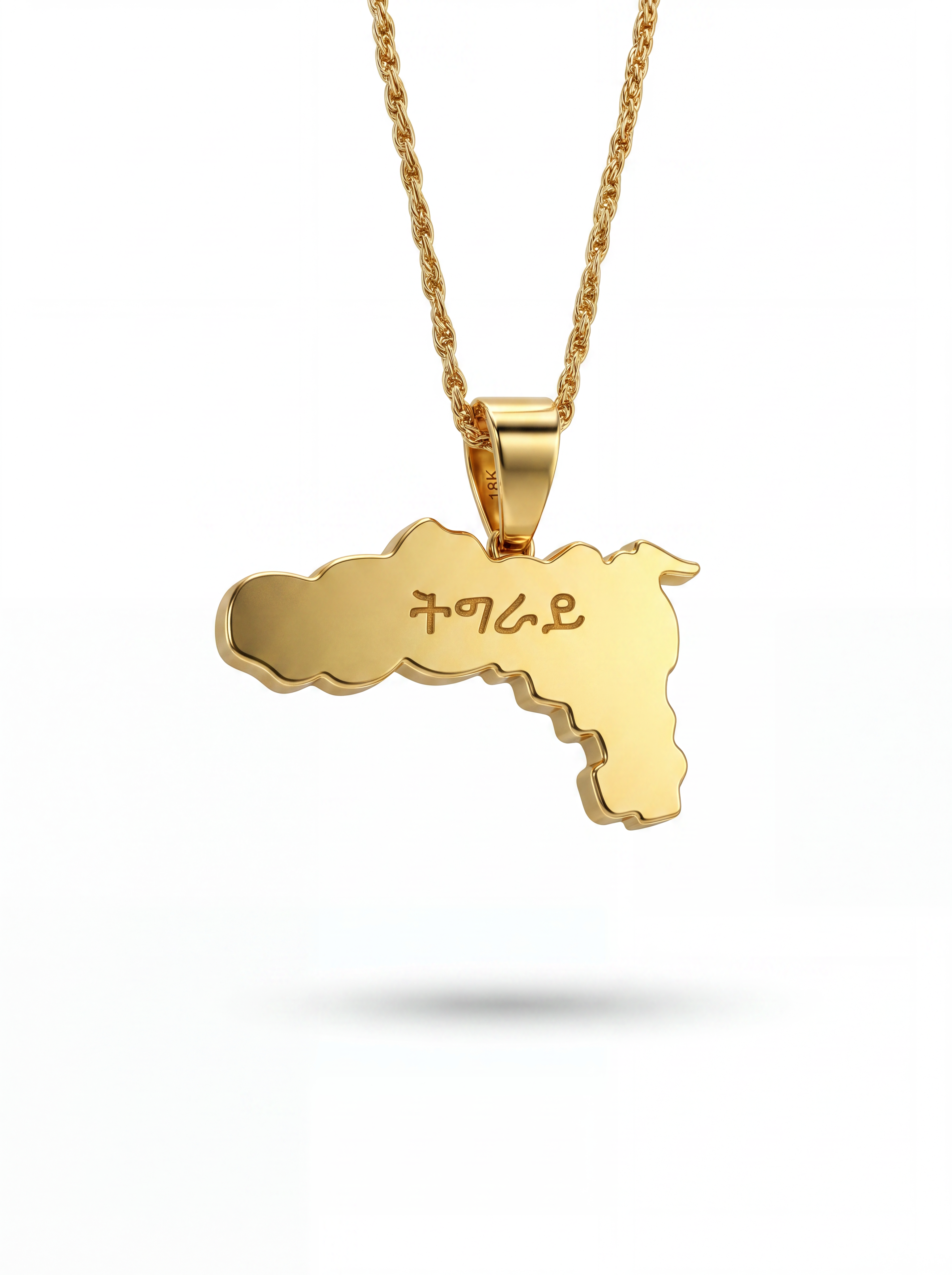 Gold plated Tigray map pendant necklace with geometric detailing and chain by KIRO UK for cultural pride and everyday wear
